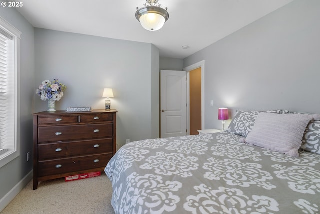 12919 NE 37th Ct, Vancouver, WA 98686 - bedroom featuring baseboards and light carpet