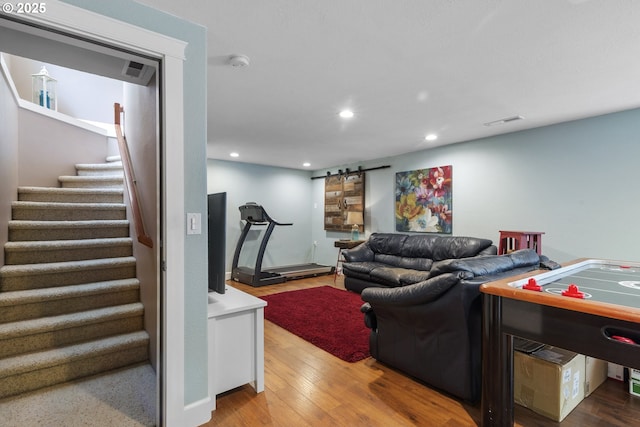 12919 NE 37th Ct, Vancouver, WA 98686 - living room with stairs, a barn door, recessed lighting, and wood finished floors