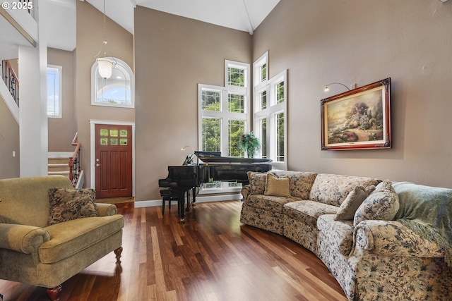 12919 NE 37th Ct, Vancouver, WA 98686 - living room with high vaulted ceiling, wood finished floors, and stairway