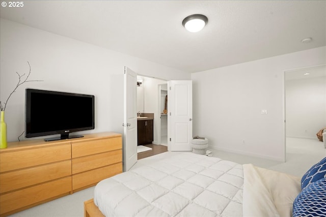 4891 NW Blandy Ter, Portland, OR 97229 - bedroom featuring baseboards and ensuite bath