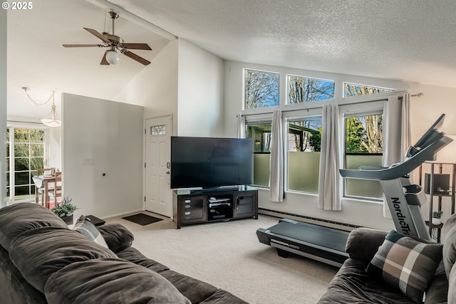 living room with high vaulted ceiling, carpet floors, a baseboard heating unit, ceiling fan, and a textured ceiling