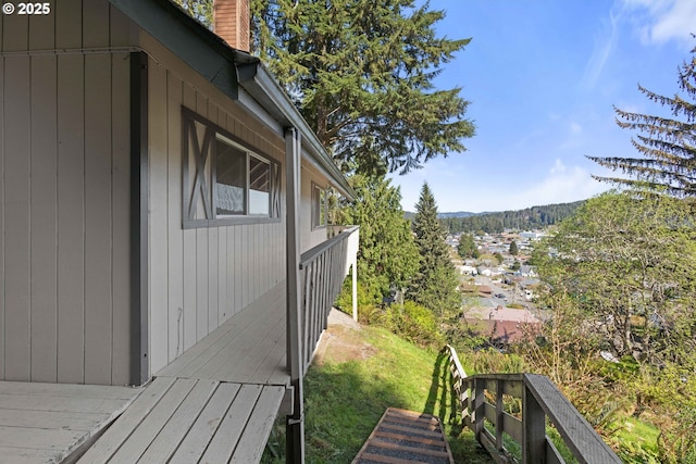 view of side of home featuring a chimney