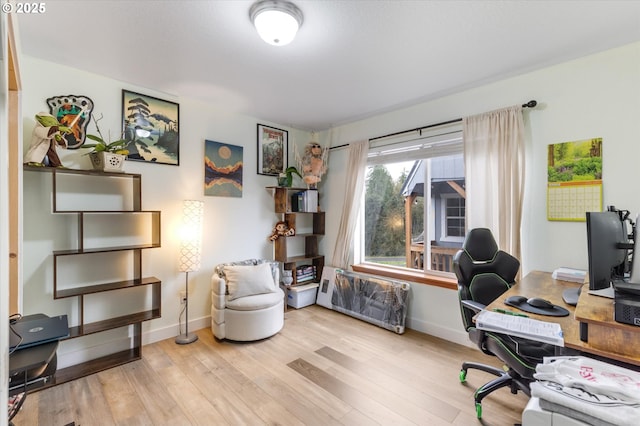 110 Axis Rd, Castle Rock, WA 98611 - office area with baseboards and wood finished floors