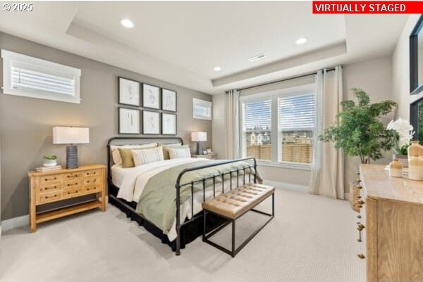 10494 SE Reverent Rd Unit 315, Happy Valley, OR 97086 - bedroom featuring recessed lighting, a raised ceiling, baseboards, and light carpet