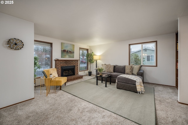 living room with carpet, a fireplace, and baseboards