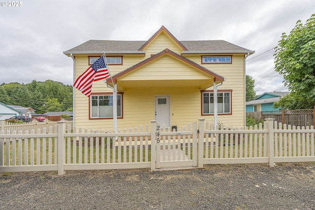 245 NE Balm St, Sheridan, OR 97378 - view of front of house with a shingled roof and a fenced front yard