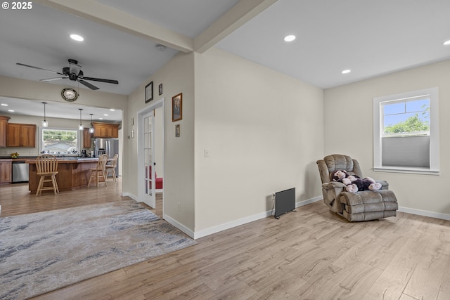245 NE Balm St, Sheridan, OR 97378 - sitting room with light wood-type flooring, baseboards, beam ceiling, recessed lighting, and a ceiling fan