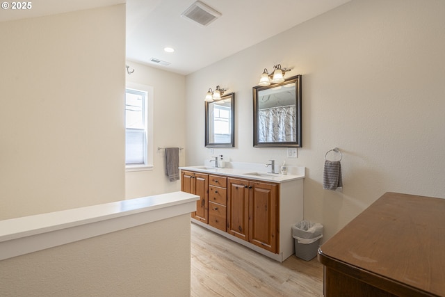 245 NE Balm St, Sheridan, OR 97378 - full bath with wood finished floors and double vanity
