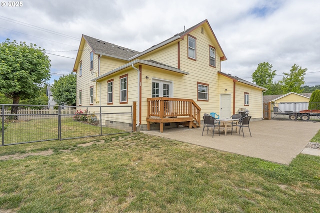 245 NE Balm St, Sheridan, OR 97378 - back of property with a patio area and a deck