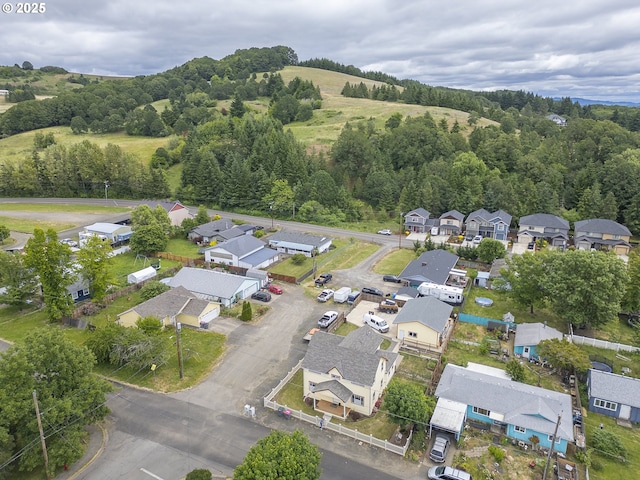 245 NE Balm St, Sheridan, OR 97378 - aerial view of property's location featuring nearby suburban area and a heavily wooded area