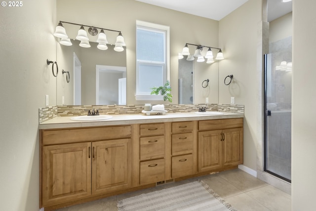 3678 Snowberry Rd, Eugene, OR 97403 - bathroom with double vanity, tile patterned flooring, a stall shower, and backsplash