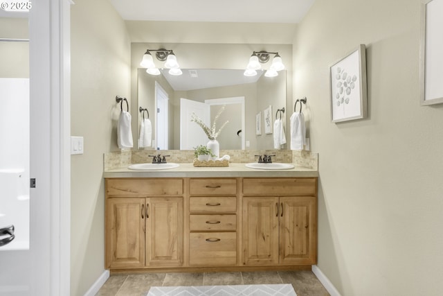 3678 Snowberry Rd, Eugene, OR 97403 - full bath with double vanity, tile patterned floors, and baseboards