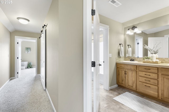 3678 Snowberry Rd, Eugene, OR 97403 - full bathroom featuring double vanity, baseboards, and tasteful backsplash
