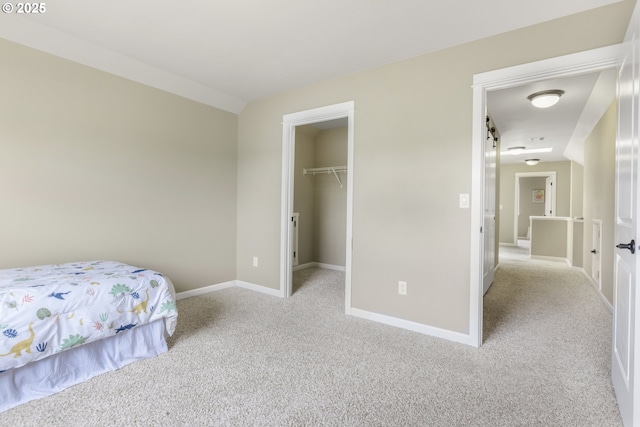 3678 Snowberry Rd, Eugene, OR 97403 - carpeted bedroom with baseboards, a spacious closet, and a closet