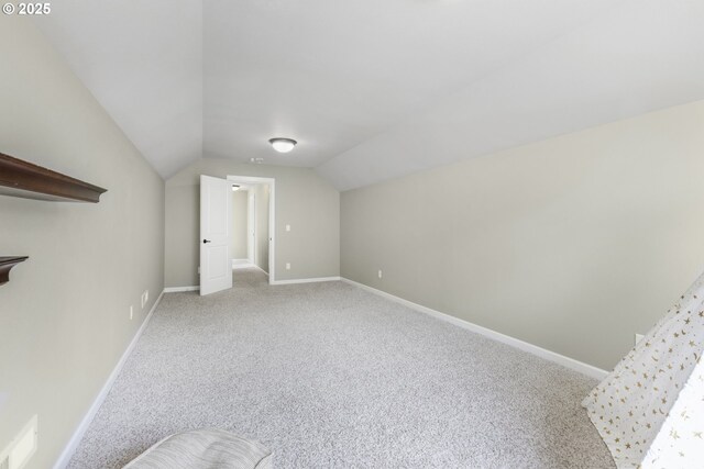3678 Snowberry Rd, Eugene, OR 97403 - additional living space featuring carpet flooring, vaulted ceiling, and baseboards