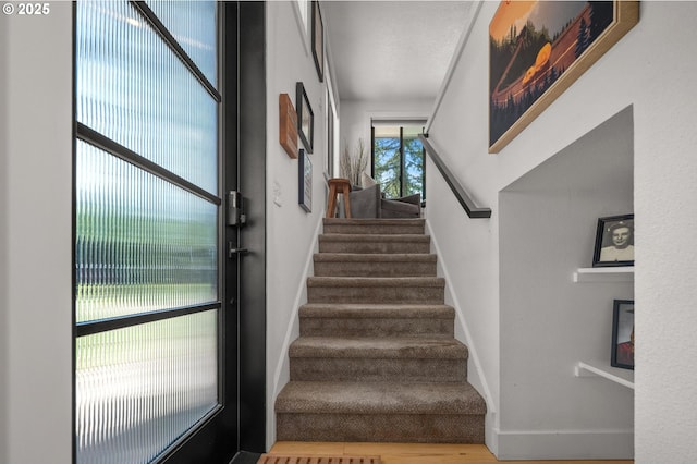 19919 SE Borges Rd, Damascus, OR 97089 - stairway with baseboards and wood finished floors