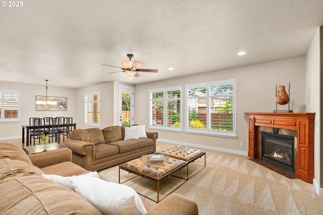 living room featuring baseboards and a wealth of natural light