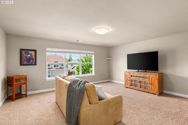 carpeted living room with baseboards