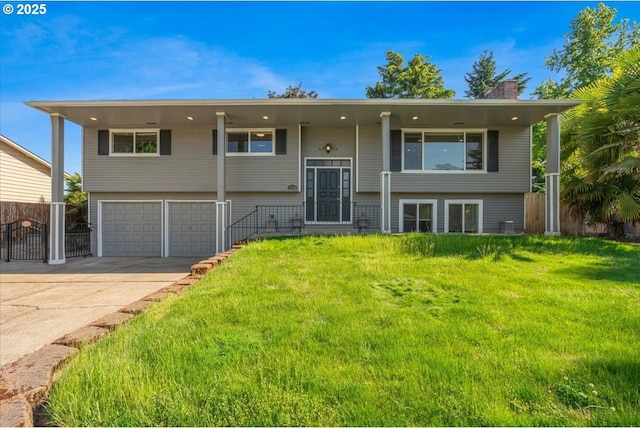2706 SE Spruce St, Hillsboro, OR 97123 - bi-level home with an attached garage, driveway, and a chimney