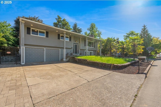 2706 SE Spruce St, Hillsboro, OR 97123 - split foyer home featuring an attached garage and concrete driveway