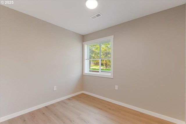 2706 SE Spruce St, Hillsboro, OR 97123 - unfurnished room featuring light wood-style floors and baseboards