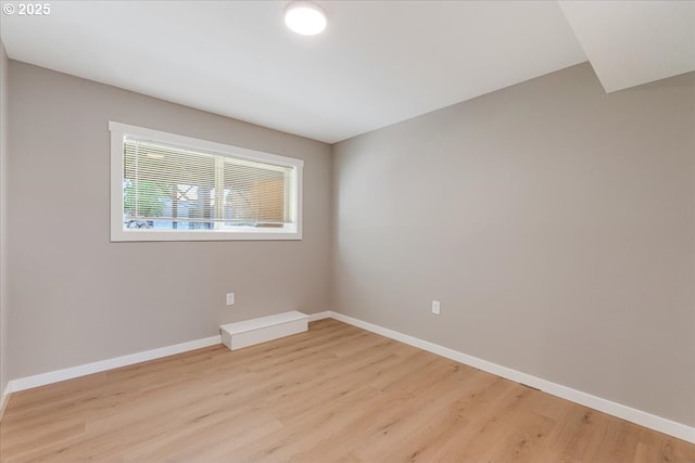 2706 SE Spruce St, Hillsboro, OR 97123 - spare room featuring light wood-type flooring and baseboards