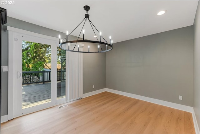 2706 SE Spruce St, Hillsboro, OR 97123 - unfurnished dining area with light wood finished floors, baseboards, a chandelier, and recessed lighting