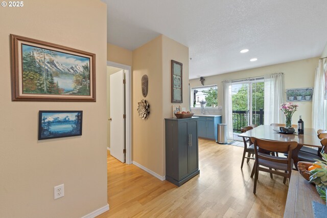 6708 N Pittsburg Ave, Portland, OR 97203 - dining room featuring light wood finished floors, baseboards, recessed lighting, and a textured ceiling