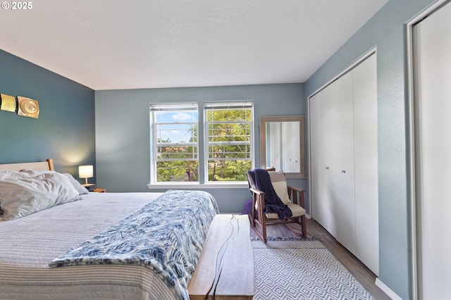 6708 N Pittsburg Ave, Portland, OR 97203 - bedroom with wood finished floors and a closet