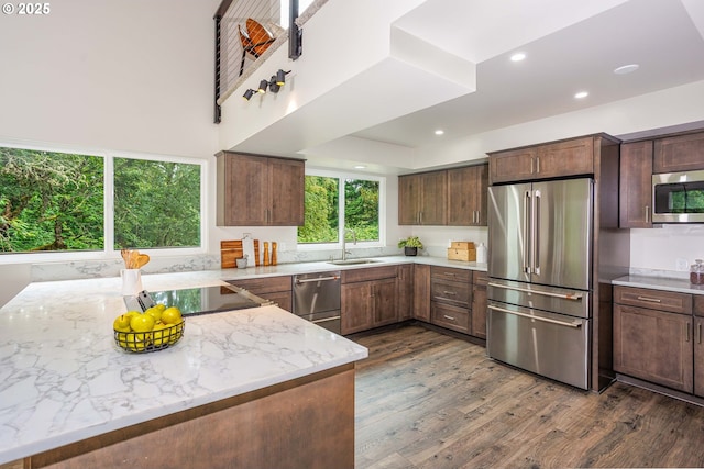 33500 E Bell Rd, Corbett, OR 97019 - kitchen with stainless steel appliances, dark wood-style floors, recessed lighting, and light stone counters