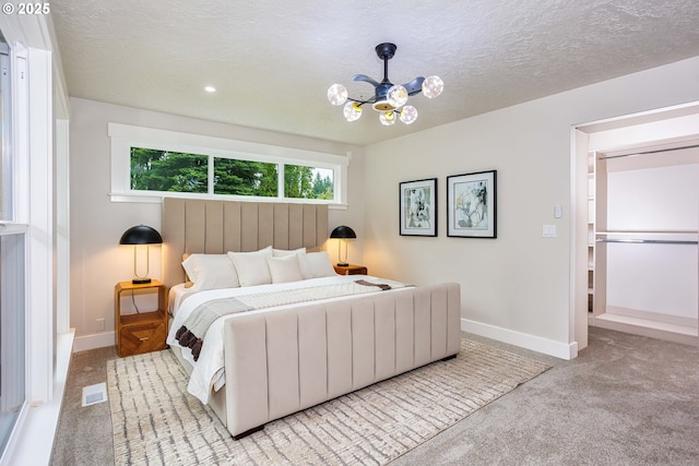 33500 E Bell Rd, Corbett, OR 97019 - bedroom with carpet flooring, a chandelier, and a textured ceiling