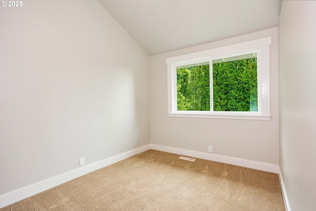 33500 E Bell Rd, Corbett, OR 97019 - spare room featuring carpet floors and vaulted ceiling