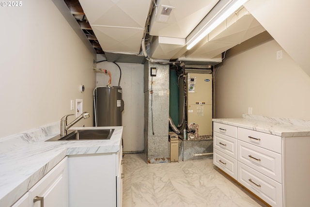 33500 E Bell Rd, Corbett, OR 97019 - basement featuring light marble finish floors, electric water heater, and heating unit