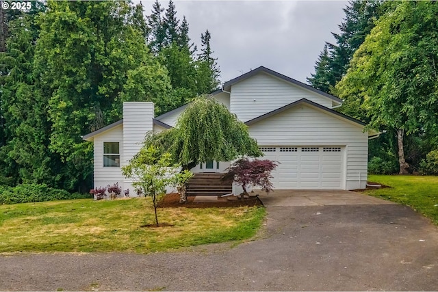 33500 E Bell Rd, Corbett, OR 97019 - view of front of home featuring driveway, a front lawn, a garage, and a chimney