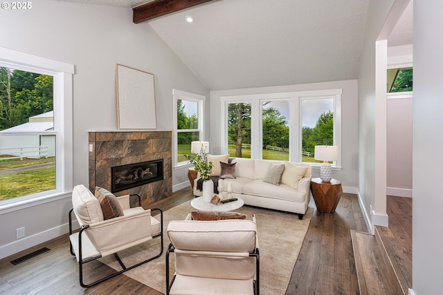 33500 E Bell Rd, Corbett, OR 97019 - living room with wood finished floors, a tiled fireplace, and plenty of natural light