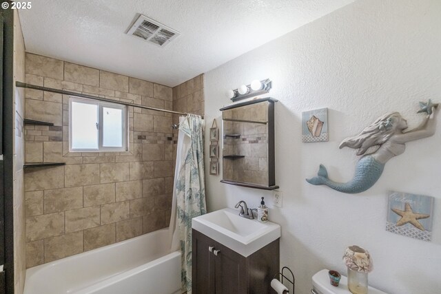 31501 Stoltz Hill Rd, Lebanon, OR 97355 - bathroom featuring shower / bathtub combination with curtain, toilet, vanity, and a textured ceiling