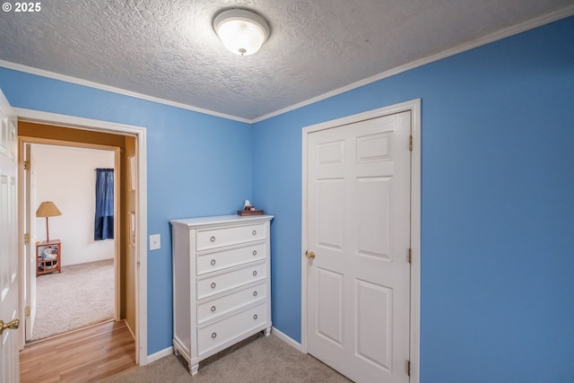 31501 Stoltz Hill Rd, Lebanon, OR 97355 - carpeted bedroom with a textured ceiling, ornamental molding, wood finished floors, and baseboards
