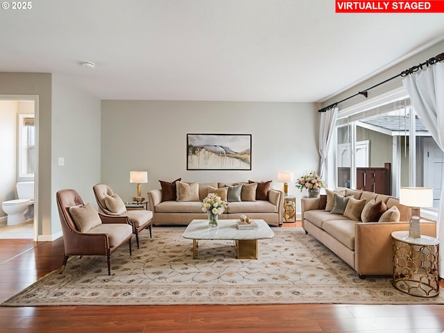 42019 NW Oak Way, Banks, OR 97106 - living area with wood-type flooring and baseboards