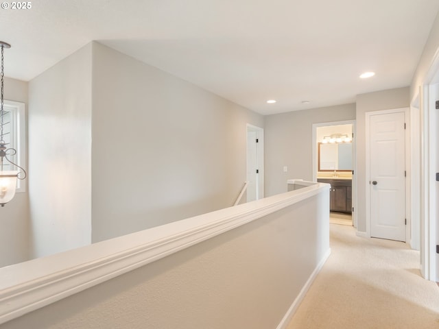 42019 NW Oak Way, Banks, OR 97106 - hallway with light carpet, recessed lighting, and an upstairs landing