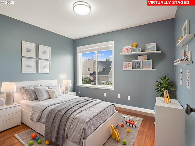 42019 NW Oak Way, Banks, OR 97106 - bedroom featuring wood finished floors