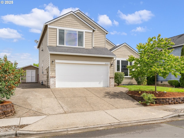 42019 NW Oak Way, Banks, OR 97106 - view of front of house featuring an attached garage, driveway, a storage shed, and brick siding