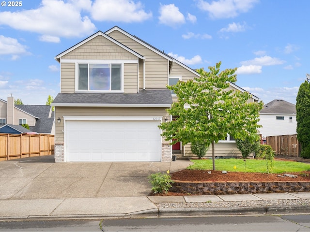42019 NW Oak Way, Banks, OR 97106 - view of front facade featuring an attached garage, driveway, and roof with shingles