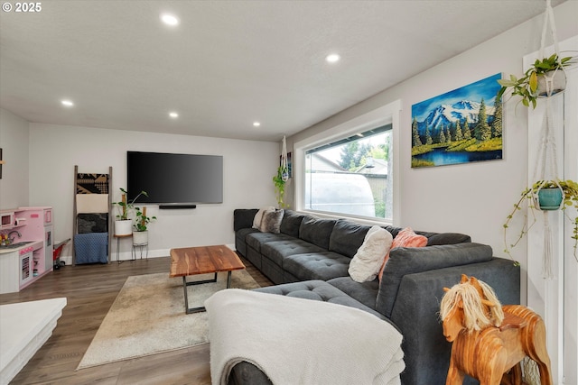 7353 SE Thiessen Rd, Milwaukie, OR 97267 - living room featuring recessed lighting and wood finished floors