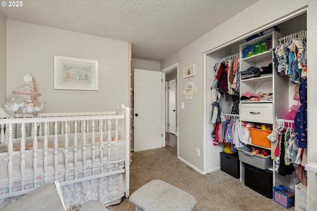 7353 SE Thiessen Rd, Milwaukie, OR 97267 - bedroom featuring carpet flooring, a closet, and a textured ceiling