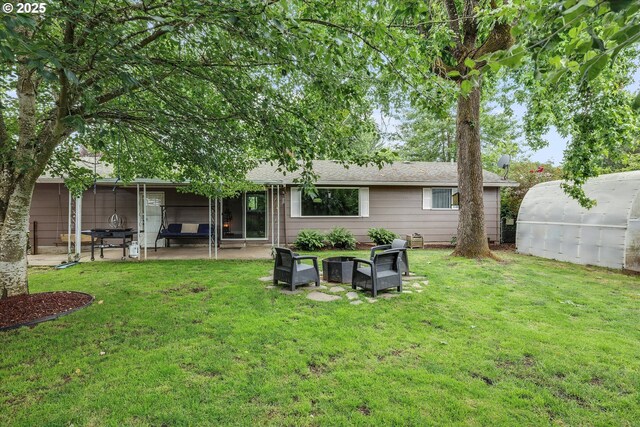 7353 SE Thiessen Rd, Milwaukie, OR 97267 - rear view of property featuring a yard, a patio area, outdoor lounge area, and a chimney