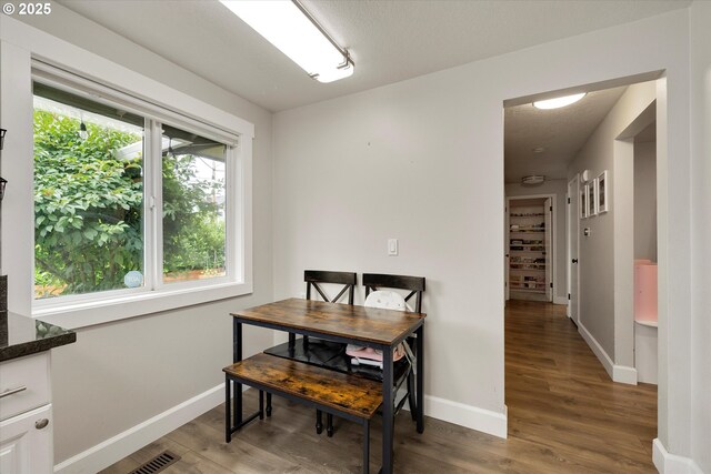 7353 SE Thiessen Rd, Milwaukie, OR 97267 - dining space featuring wood finished floors and baseboards
