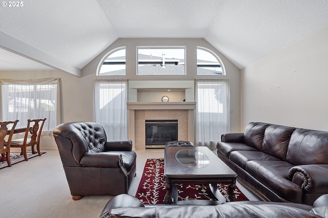 1545 NE Gertz Rd, Portland, OR 97211 - living room with lofted ceiling, carpet, healthy amount of natural light, a tiled fireplace, and a textured ceiling