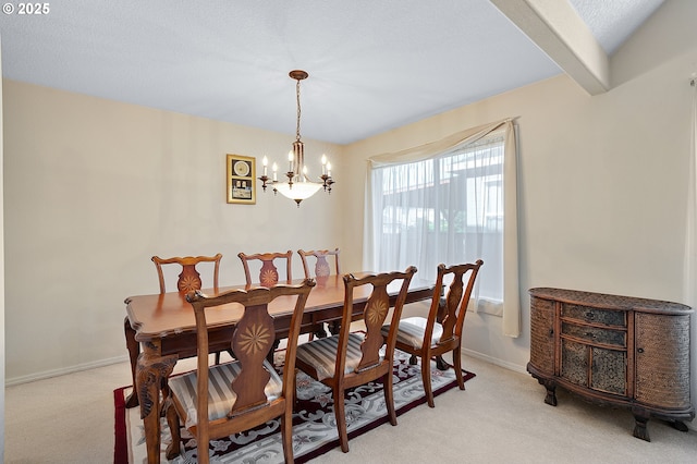 1545 NE Gertz Rd, Portland, OR 97211 - dining space with light colored carpet, a chandelier, and baseboards