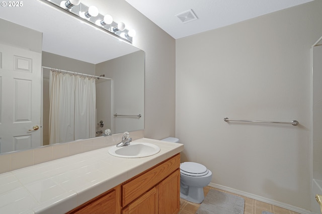 1545 NE Gertz Rd, Portland, OR 97211 - full bath with toilet, vanity, and baseboards
