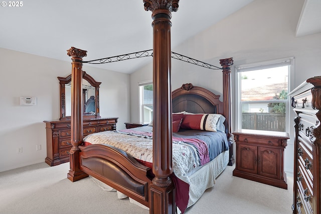 1545 NE Gertz Rd, Portland, OR 97211 - bedroom with vaulted ceiling, light colored carpet, and baseboards